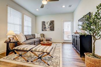 a living room with a couch and a tv